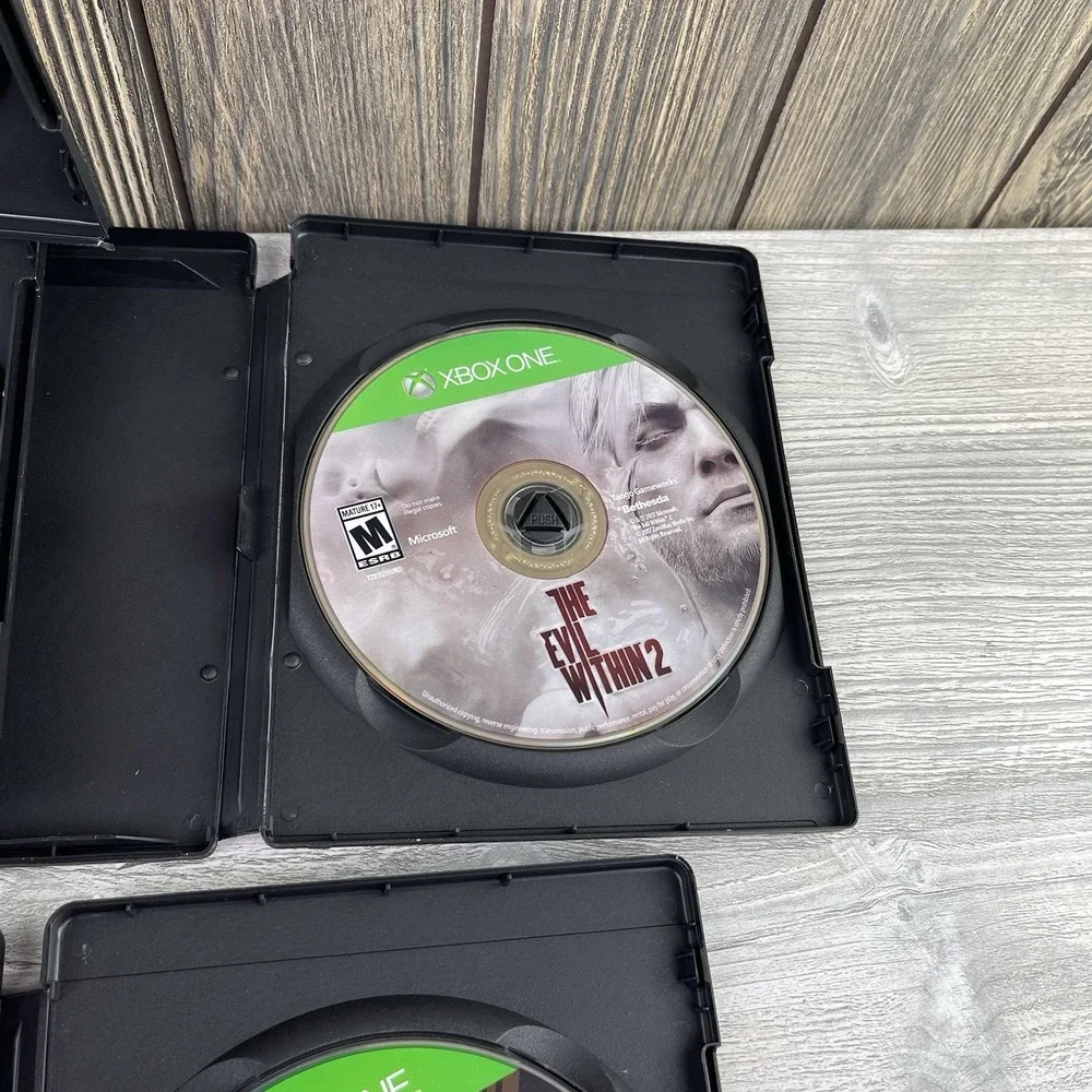 Lot of 7 Microsoft Xbox One Games - Evil Within 2,Mass Effect Andromeda,and More